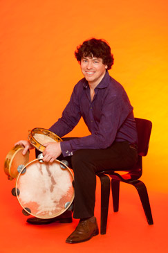 Brian with tambourines. by Robin Holland